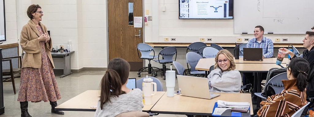 Erin Hayden presenting to a group in a classroom setting